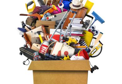 Large pile of household items, all stuffed into a box